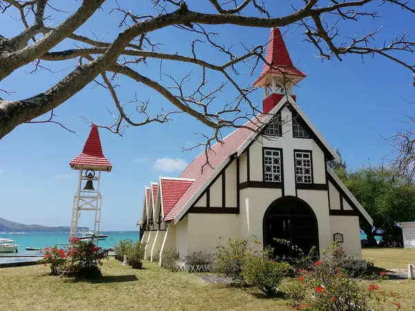 Cap Malheureux red-roofed church